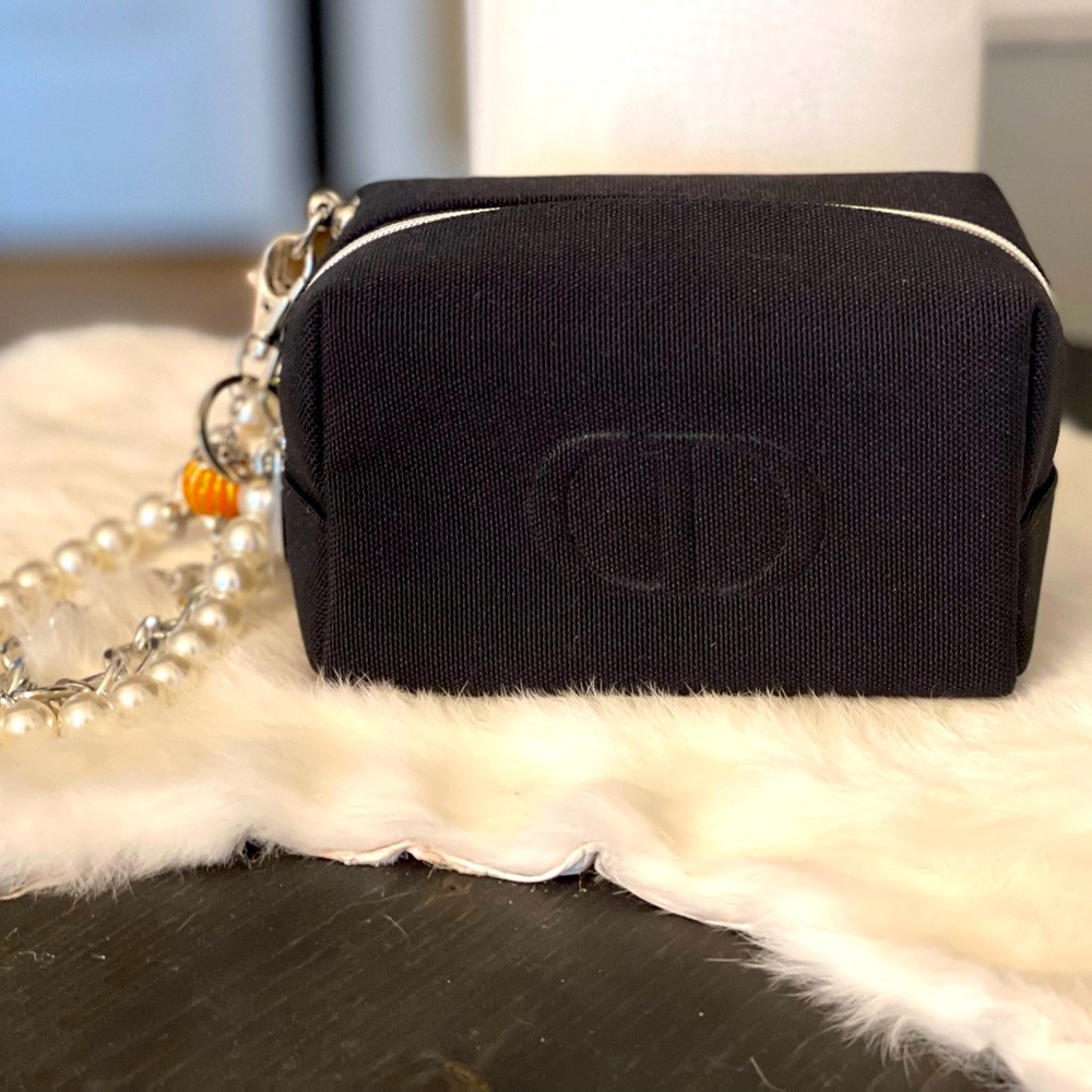 Dior black “CD” raised emblem silver & pearl wristlet & carriage keychain